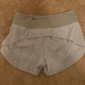 Green Lululemon Speed Up Shorts. Size 6 tall.